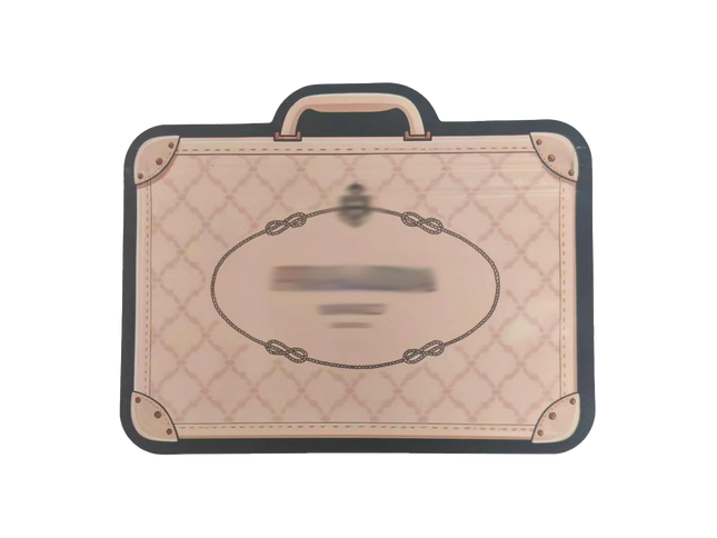 Mylar Bags Quilted suitcase-shaped mat with a handle on a white background
