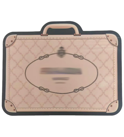 Mylar Bags Quilted suitcase-shaped mat with a handle on a white background